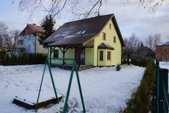 huśtawka w ogrodzi,e taraz